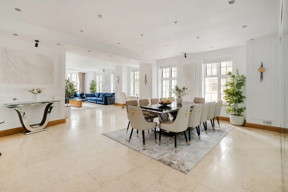 Formal dining for twelve, opening into the drawing room